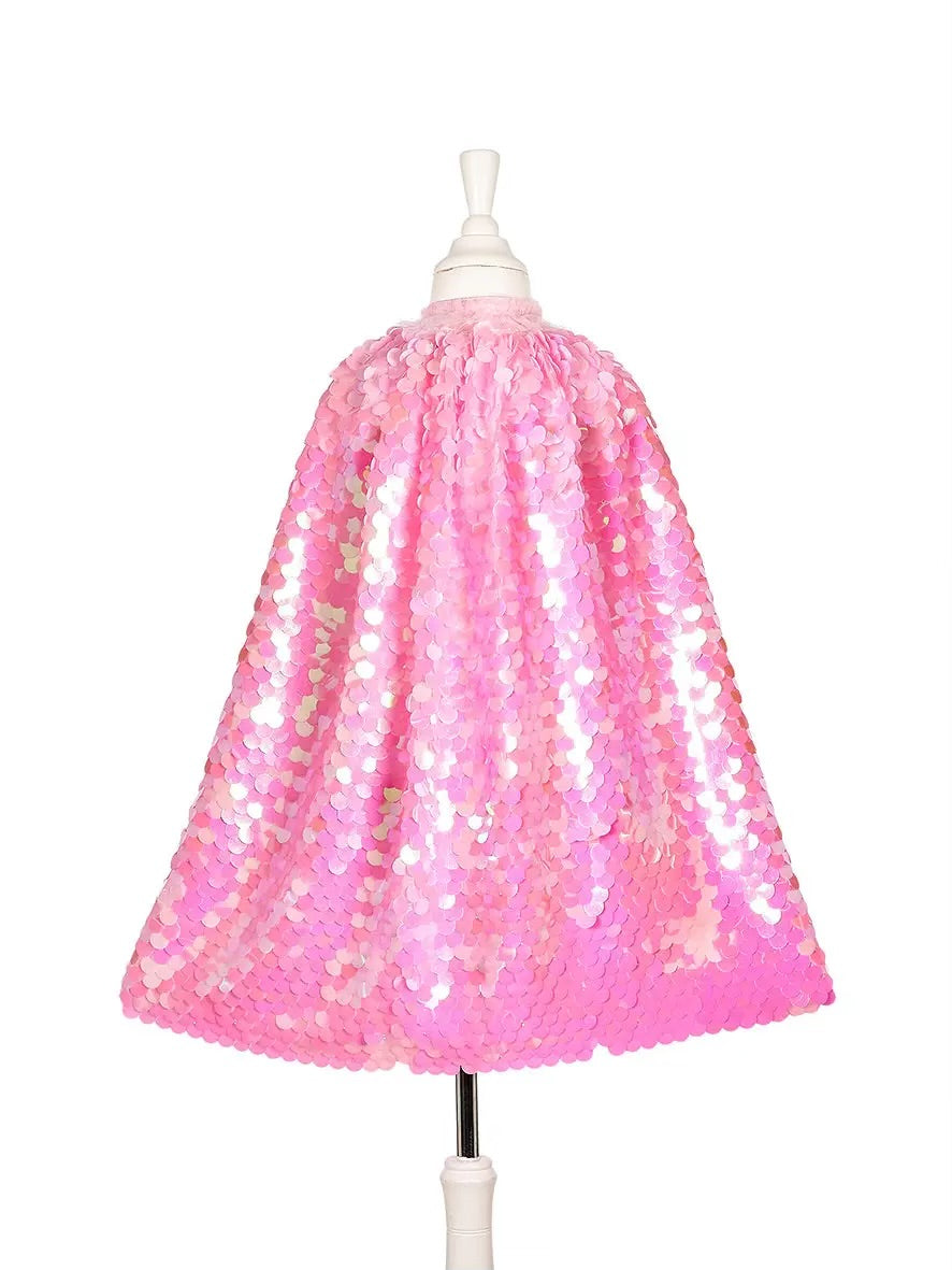 Pink sequin cape on a mannequin against a white background