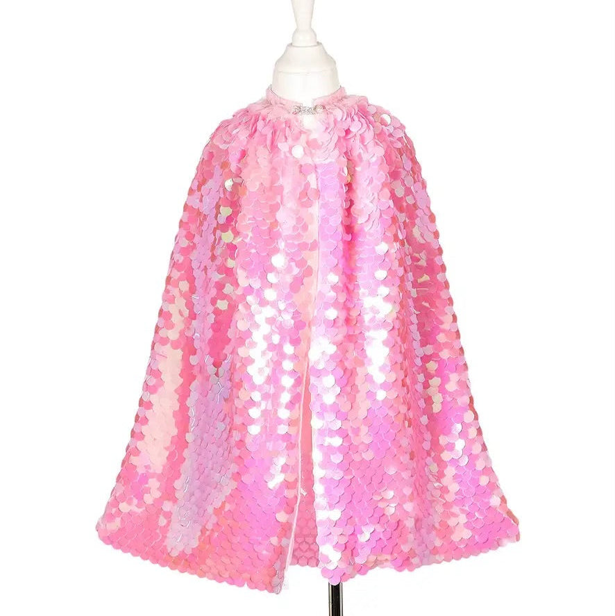 Pink sequin cape on a mannequin against a white background